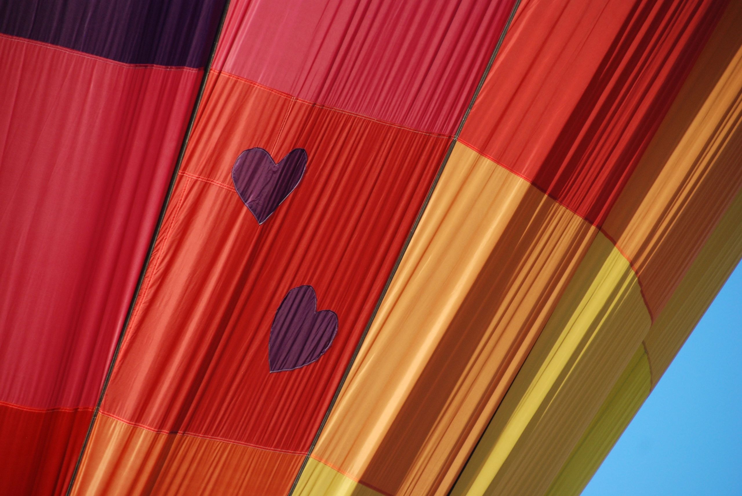 Colorful hot air balloon fabric with heart patches
