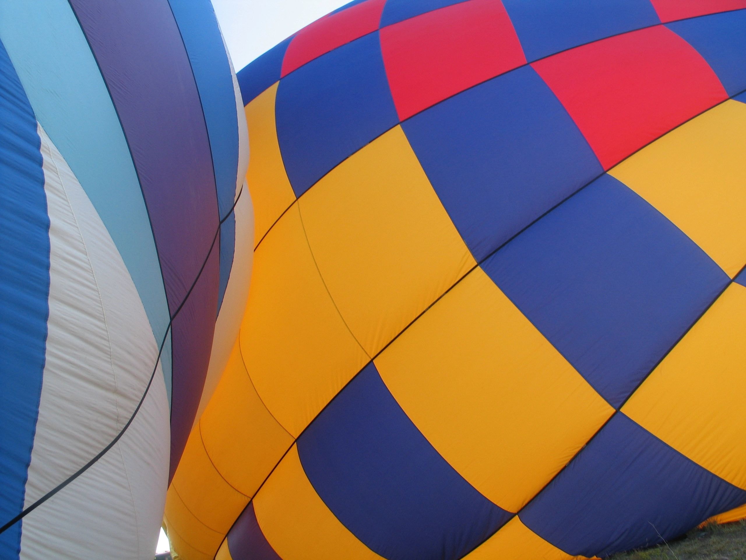 Colorful hot air balloons inflating